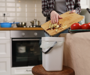 Image showing food scraps being added to composter