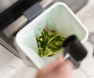 Image showing Bokashi bran being added to composter
