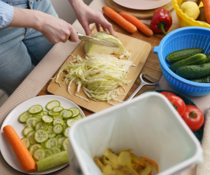 Image showing chopped food scraps being added to composter