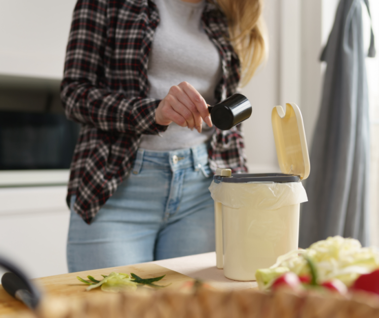 Image showing Bokashi bran being added to composter