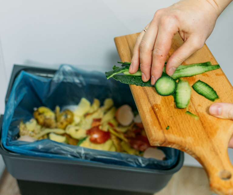 Image showing  food being added to bin