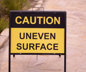 Uneven surface sign